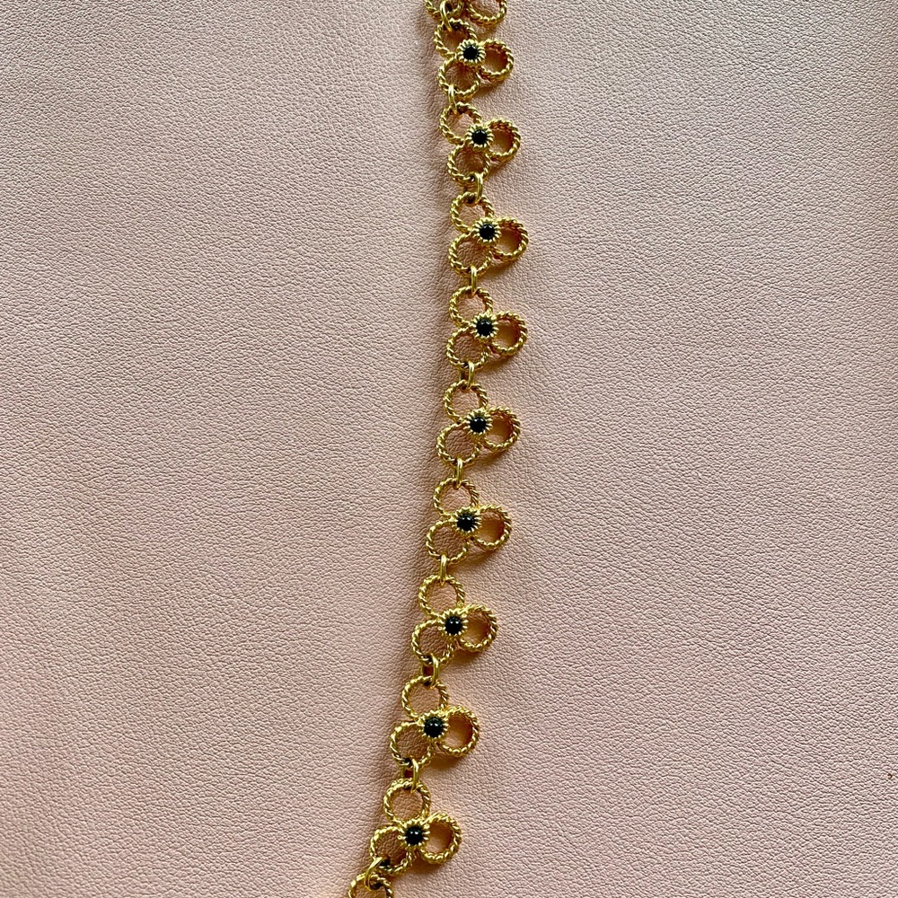 Elegant Gold and Black Floral Bracelet